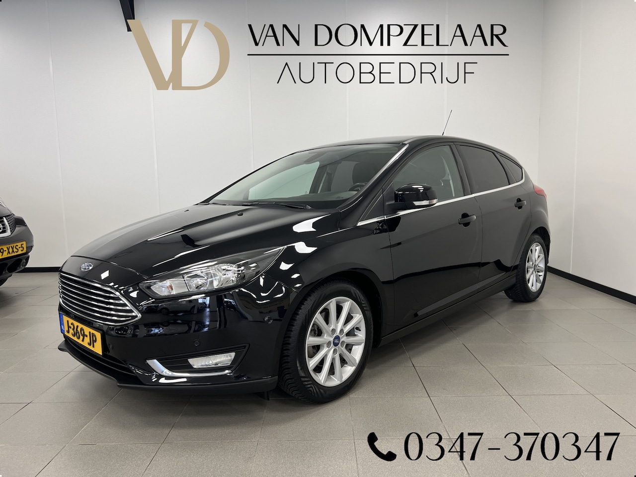 Ford Focus - 1.0 Titanium Edition 125PK / Navi / Camera / Cruise / 5-drs / - AutoWereld.nl