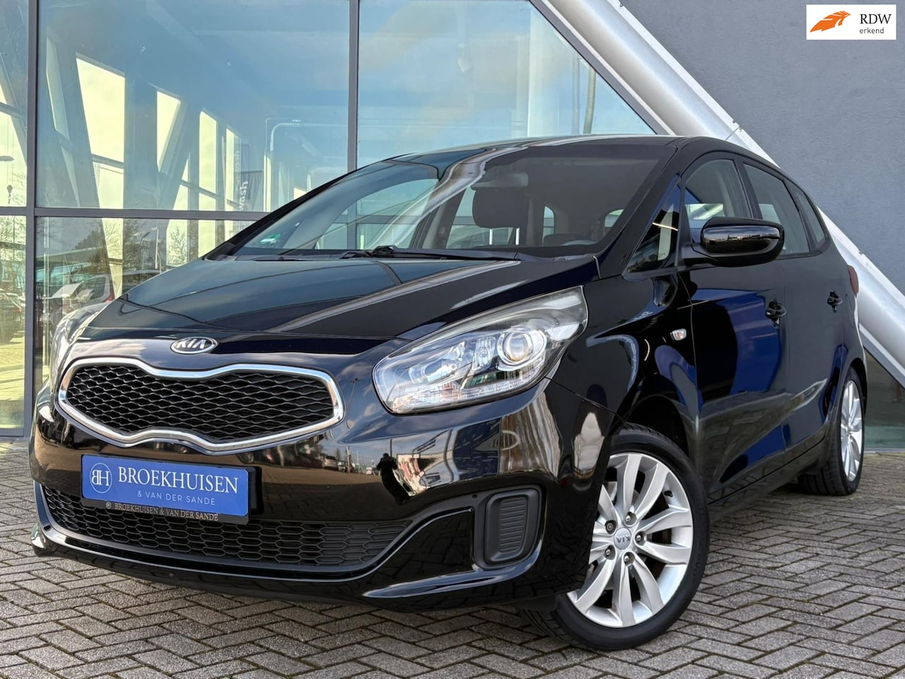 Kia Carens - 1.6 GDi First Edition 7 Pers. 135pk Navigatie / Cruise Control / Trekhaak - AutoWereld.nl