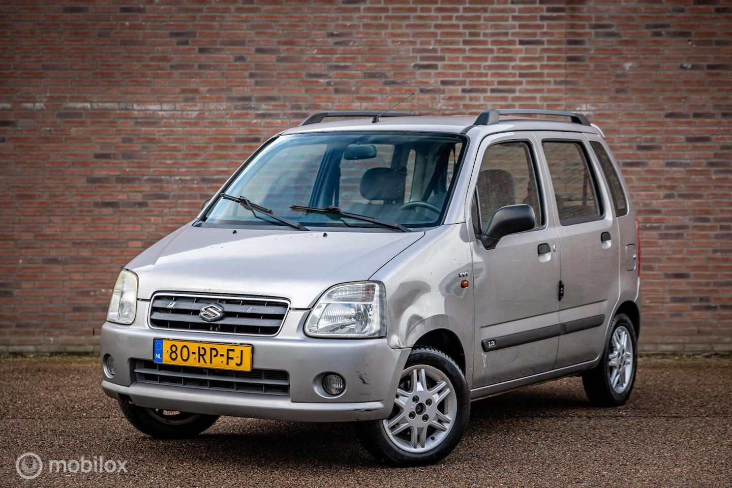 Suzuki Wagon R+ - 1.3 GLX | Nap | Airco | LM velgen - AutoWereld.nl