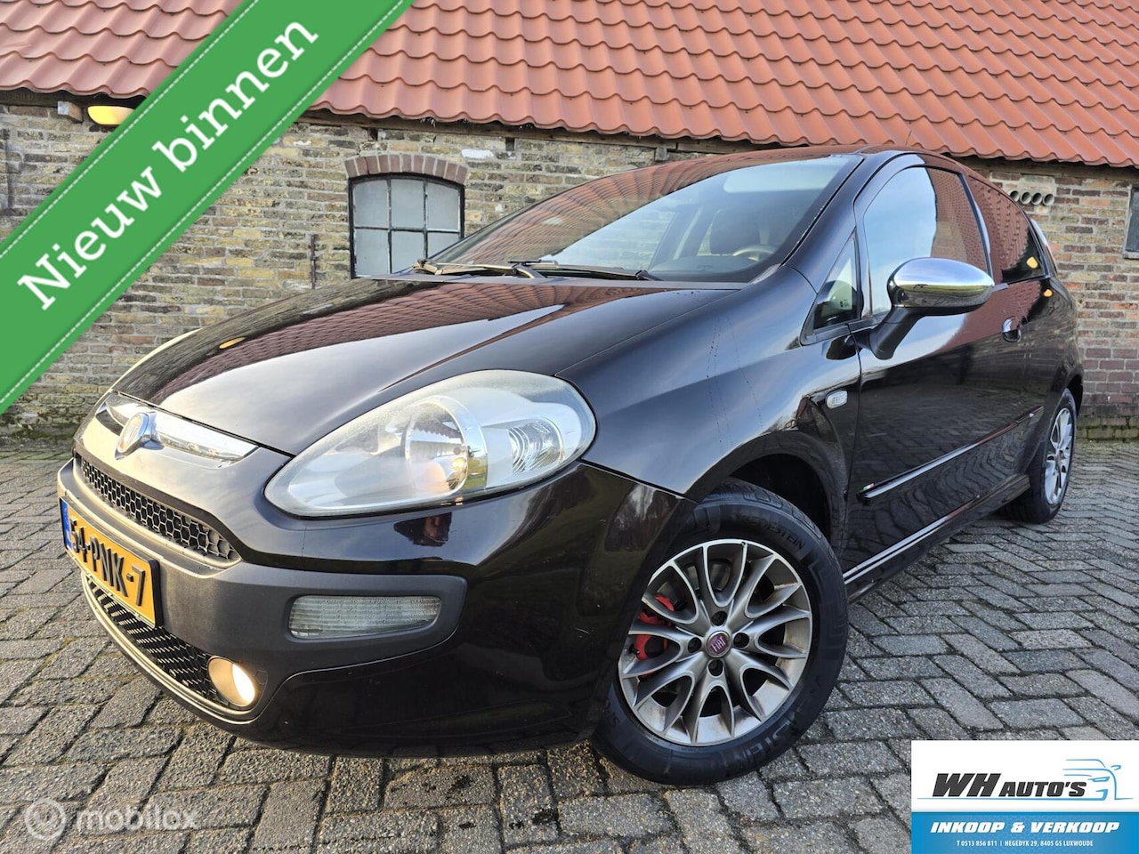 Fiat Punto Evo - 1.3 M-Jet Lounge nette auto! - AutoWereld.nl