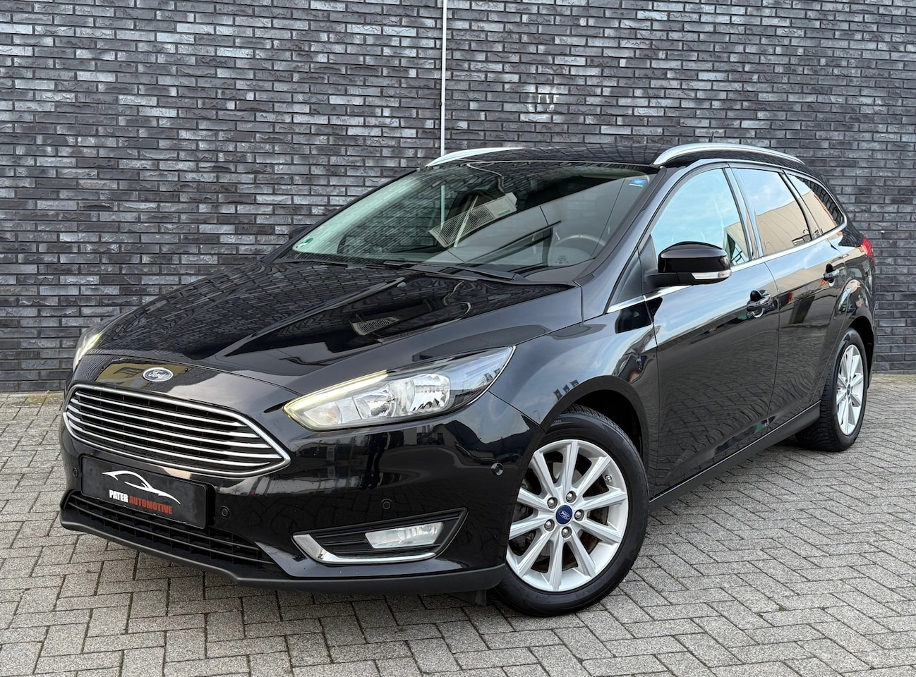 Ford Focus Wagon - 1.0 Titanium 125pk|Cruise|360pdc|Stoel&stuurverwarm|Trekhaak Afn - AutoWereld.nl