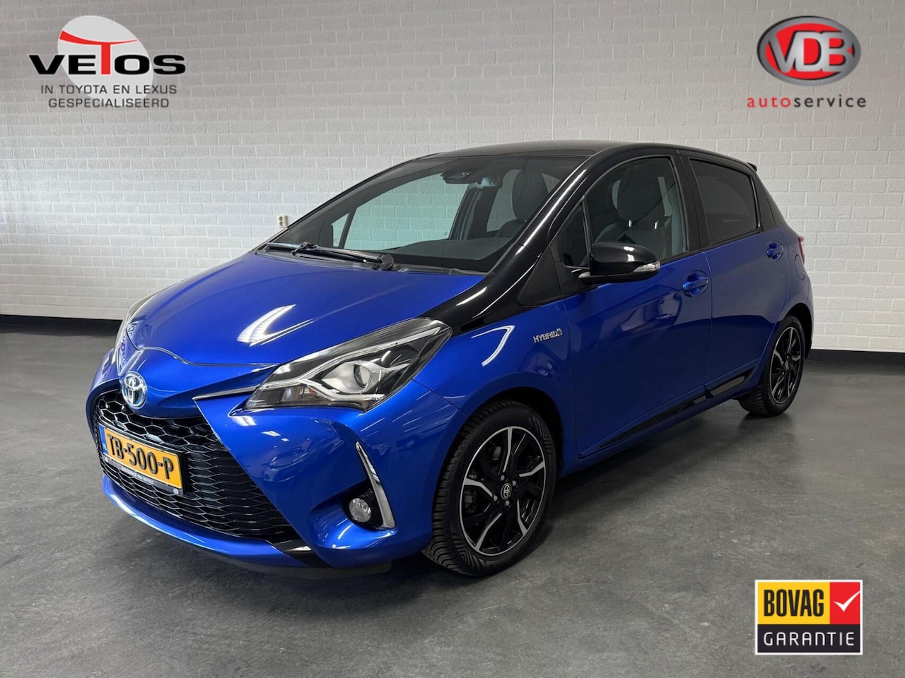 Toyota Yaris - 1.5 Hybrid Bi-Tone / Pano / Trekhaak - AutoWereld.nl
