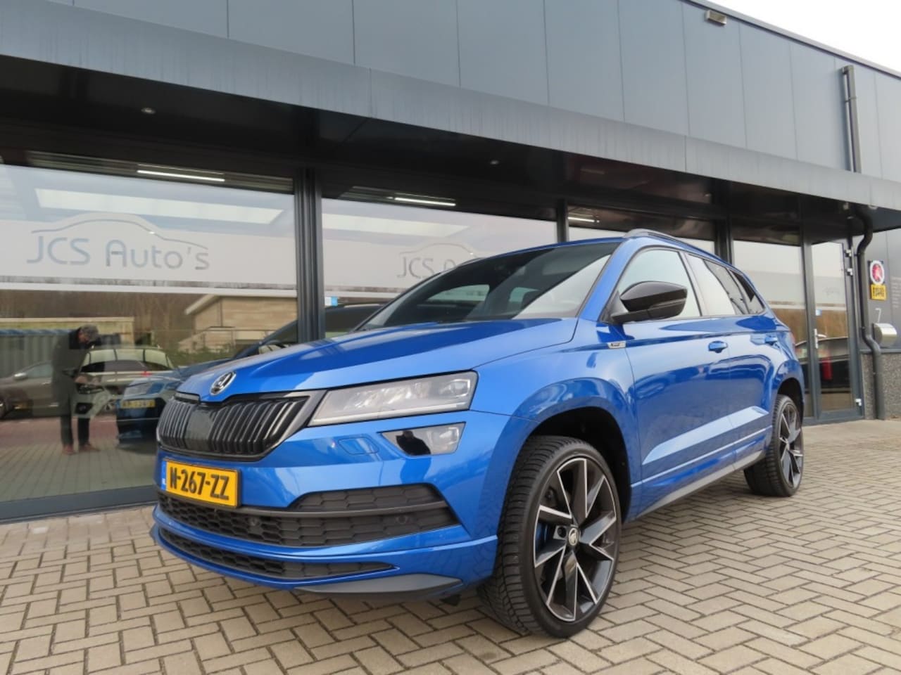 Skoda Karoq - 1.5 TSI Sportline Business Led Pano Trekhaak 2022 - AutoWereld.nl