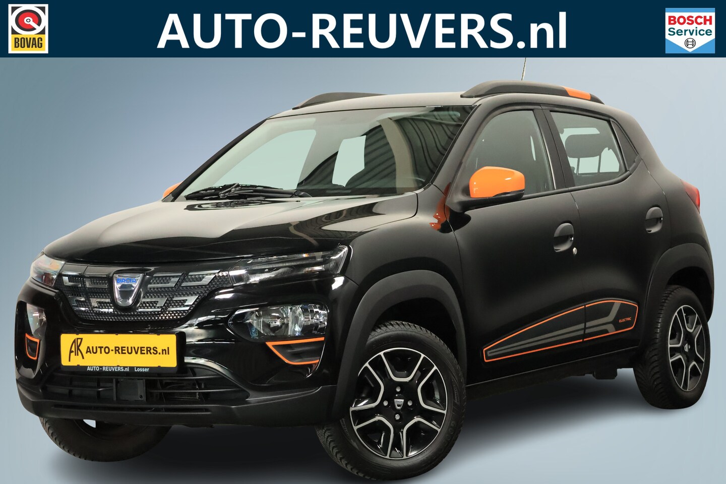Dacia Spring - Comfort Plus 27 kWh / Leder / CarPlay / Camera - AutoWereld.nl