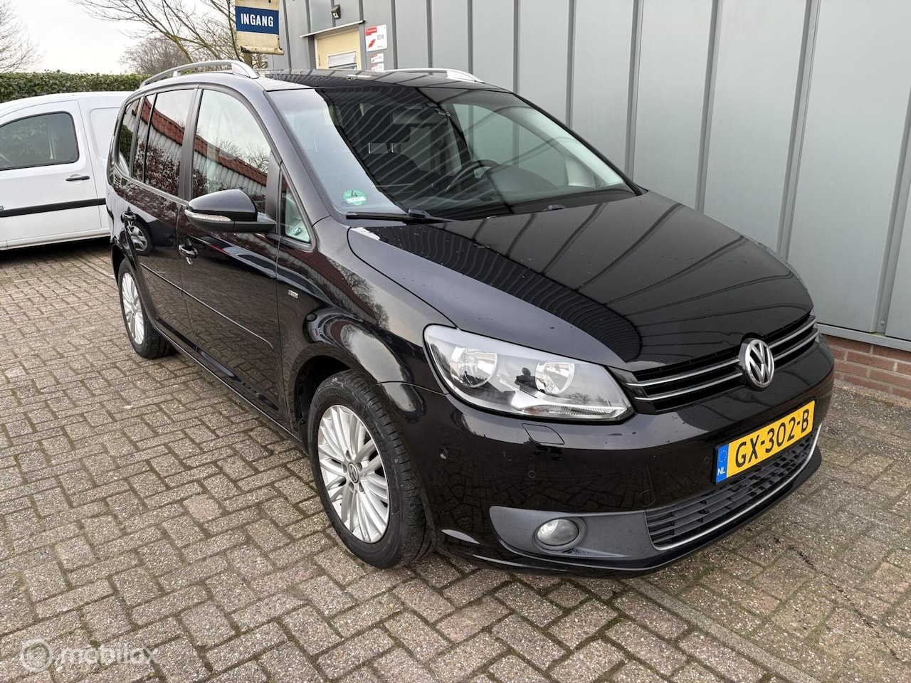 Volkswagen Touran - 1.6 TDI Highline BlueMotion 7p. 1.6 TDI Highline BlueMotion 7p. - AutoWereld.nl