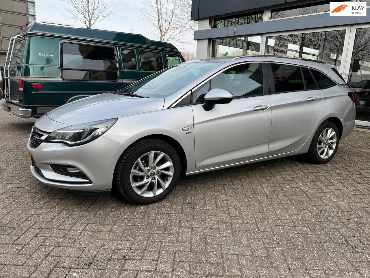 Opel Astra Sports Tourer - 1.4 Turbo 120 Jaar Edition 1.4 Turbo 120 Jaar Edition - AutoWereld.nl