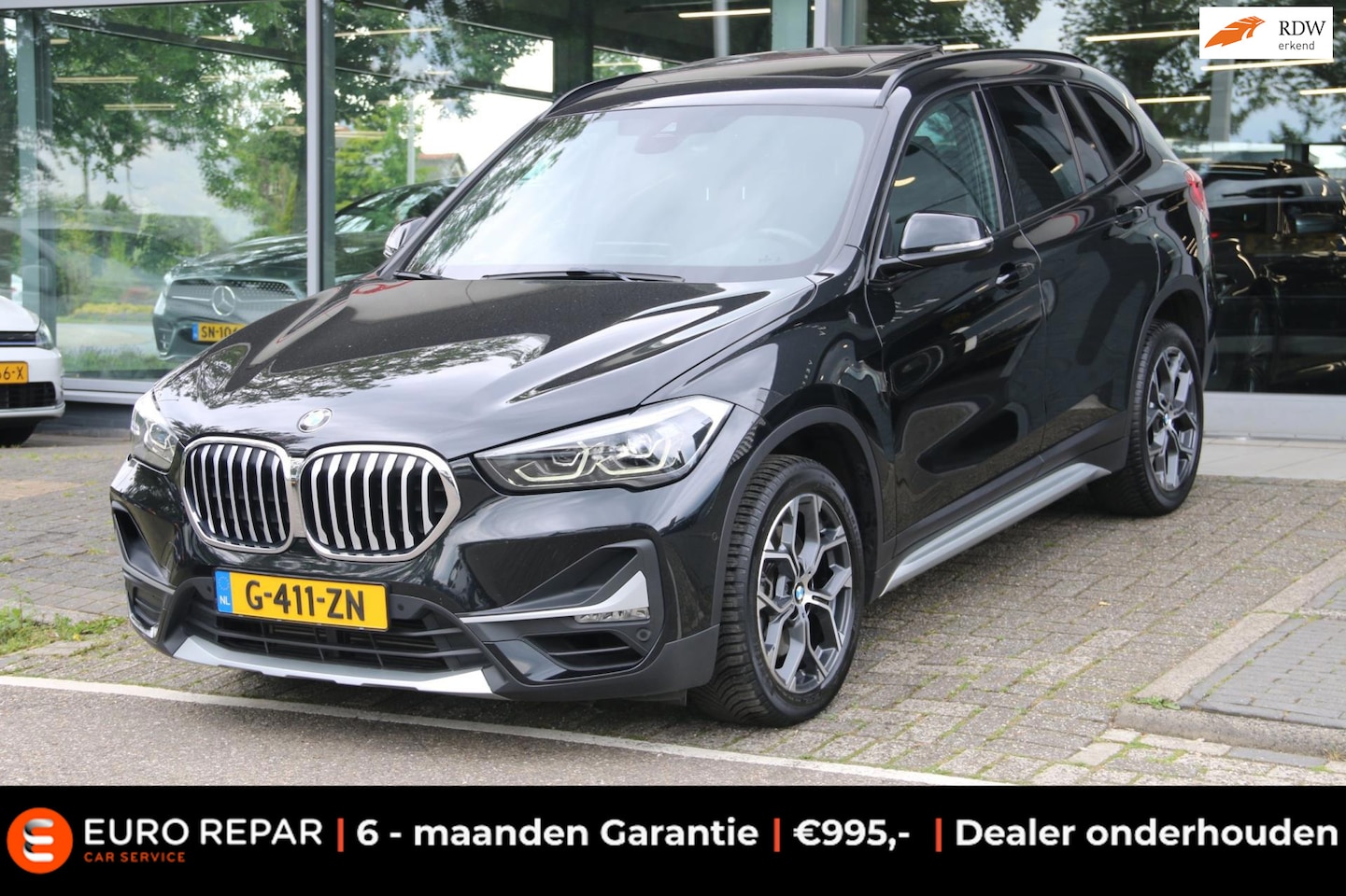 BMW X1 - SDrive20i VDL Nedcar Edition PANO-DAK NL-AUTO NAP! - AutoWereld.nl