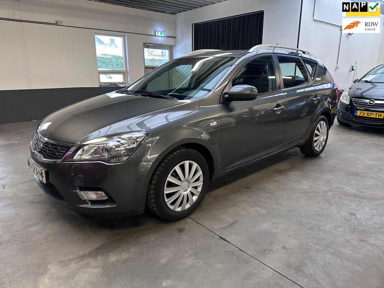 Kia Cee'd Sporty Wagon - 1.4 CVVT X-ecutive|Cruise|Nieuwe APK - AutoWereld.nl