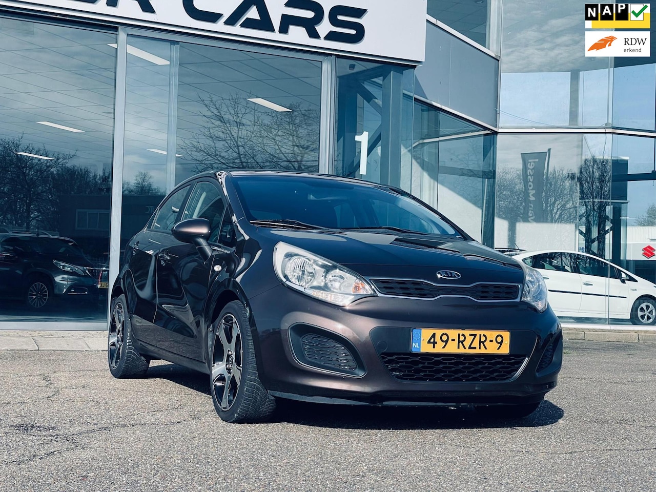 Kia Rio - 1.4 CVVT Comfort Pack 1.4 CVVT Comfort Pack, Automaat, Cruise Control, P Sensor, NAP - AutoWereld.nl