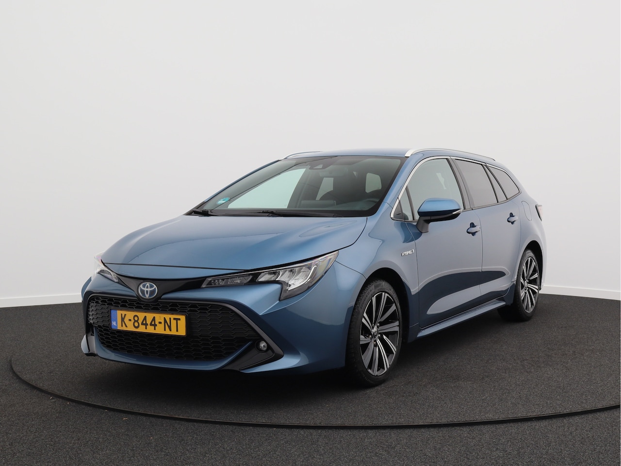 Toyota Corolla Touring Sports - 2.0 Hybrid Business Plus/ lage km/ zeer mooi! - AutoWereld.nl