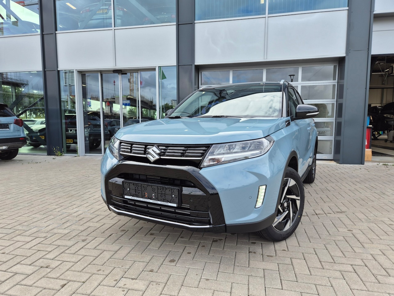 Suzuki Vitara - 1.4 Boosterjet Style Hybrid PANO - AutoWereld.nl