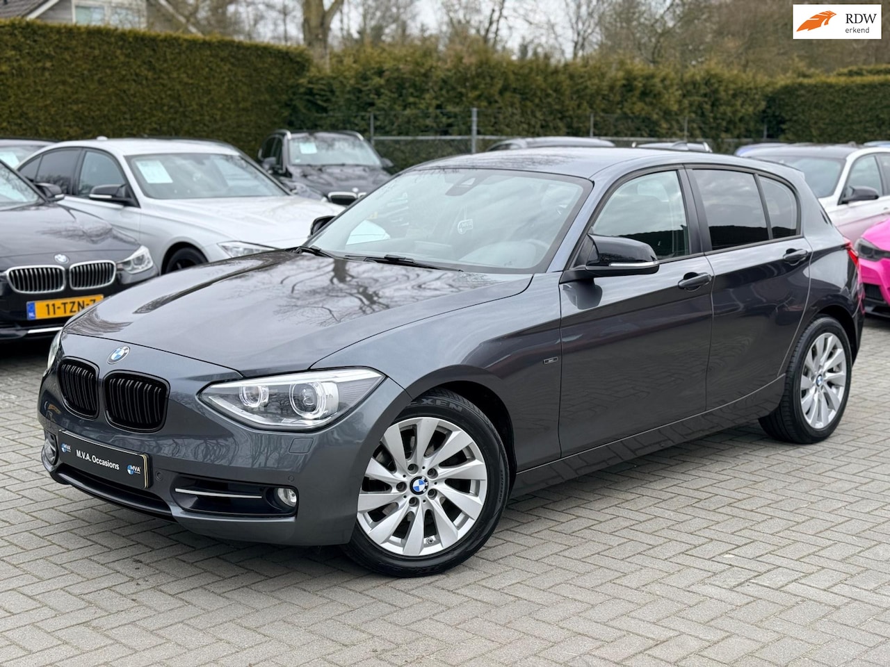 BMW 1-serie - 118i Business Sport|Ketting + Klepseals vervangen|Navigatie|Cruise control|Climate control - AutoWereld.nl