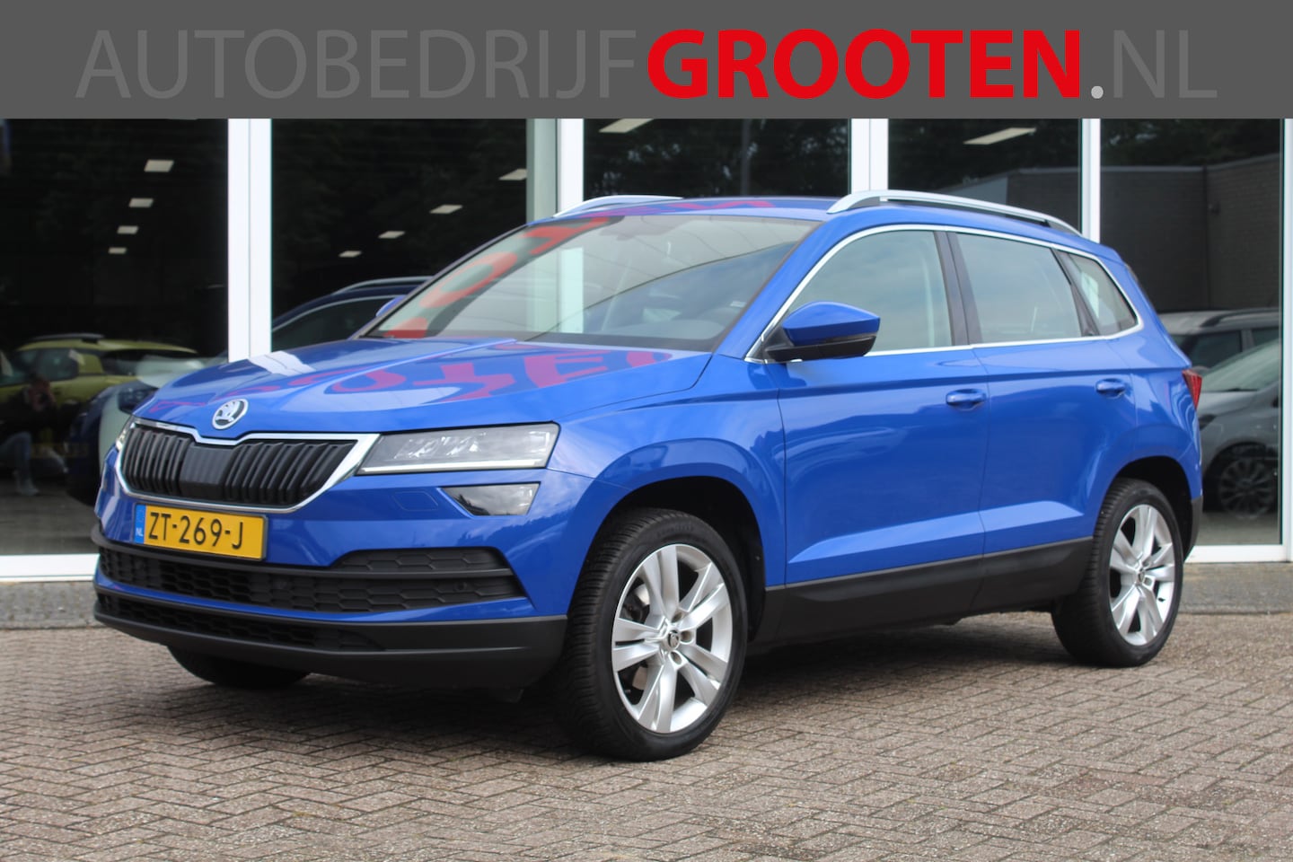 Skoda Karoq - 1.0 TSI Style Business//Navi//Camera//Stoelverwarming//Trekhaak!! - AutoWereld.nl