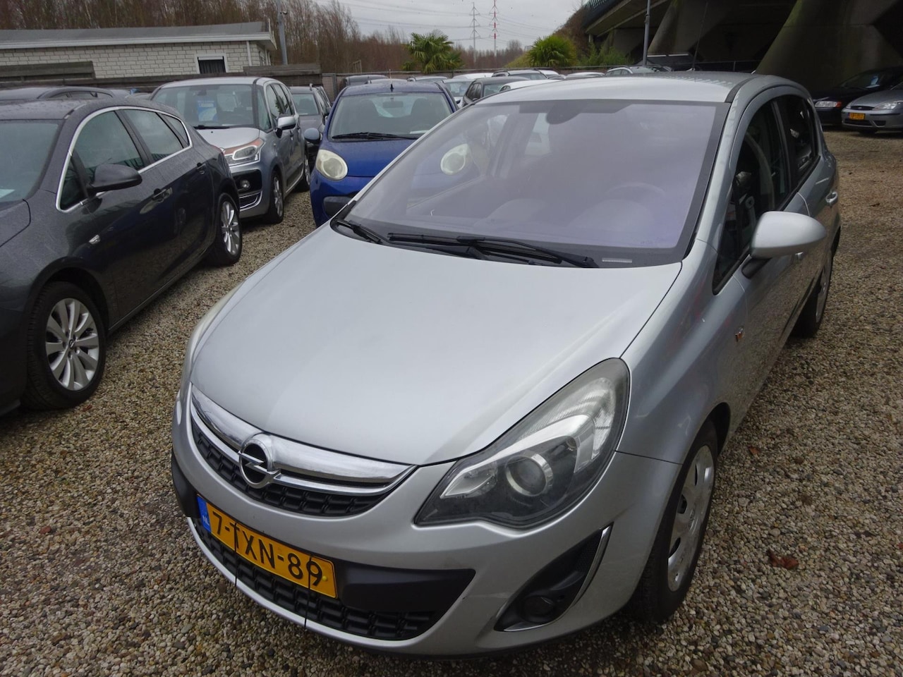 Opel Corsa - 1.4-16V Cosmo airco navigatie cruise control - AutoWereld.nl