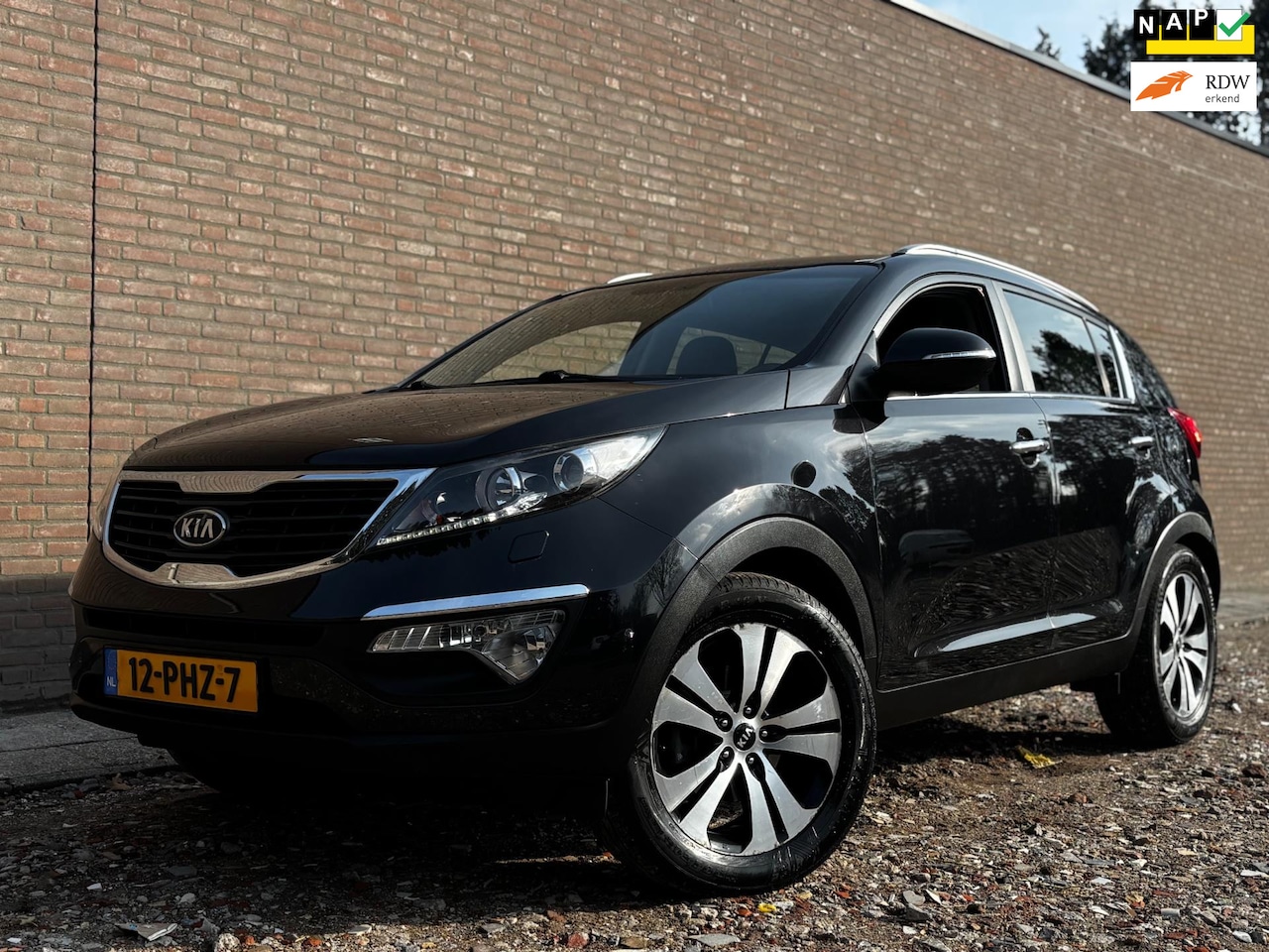 Kia Sportage - 2.0 X-clusive | Navi | Camera | Trekhaak | NAP - AutoWereld.nl