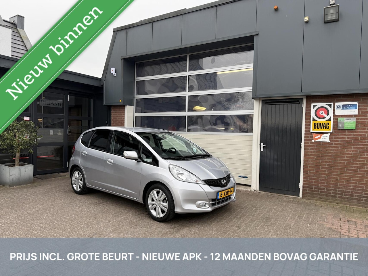 Honda Jazz - 1.4 36.000KM! TH/NAVI/ECC/CRUISE *ALL-IN PRIJS* - AutoWereld.nl
