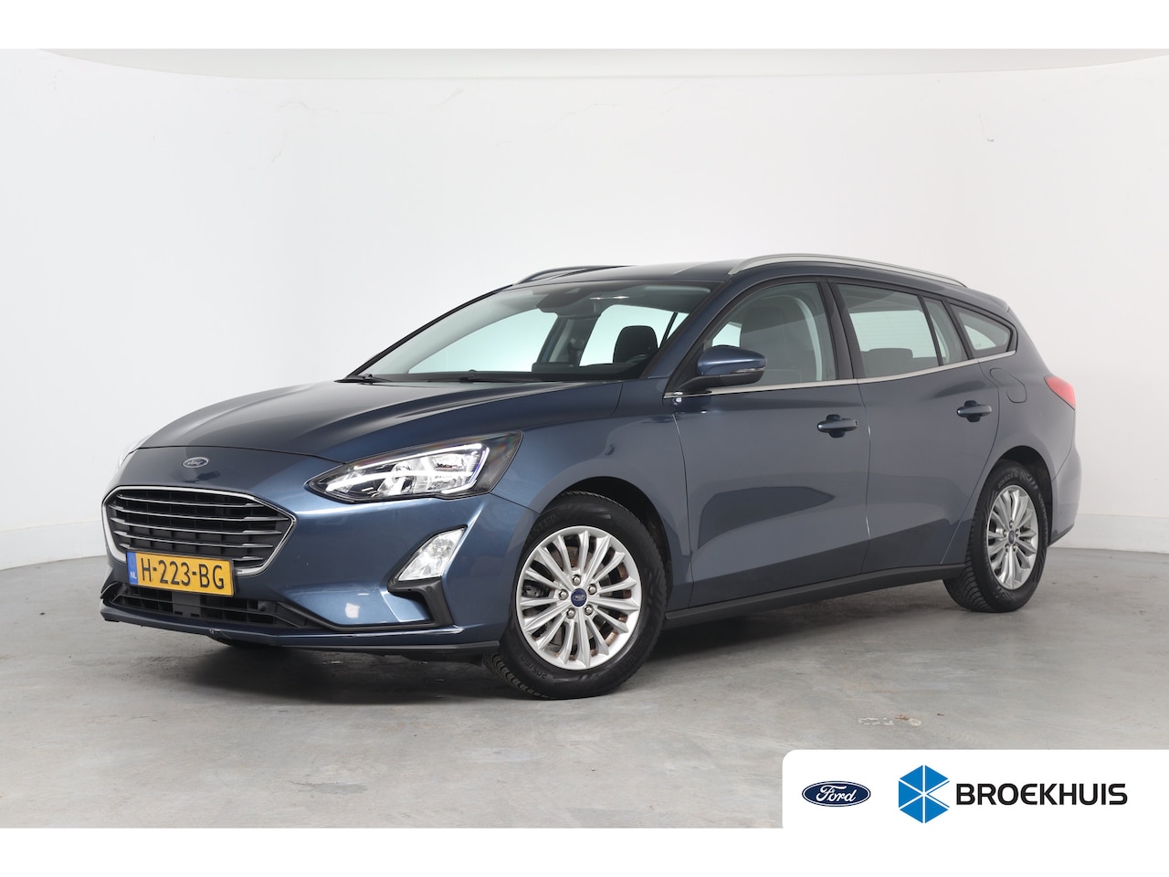 Ford Focus Wagon - 1.0 EcoBoost Titanium Business | Winter Pack | Navi | Clima | Keyless | Parkeersensoren V+ - AutoWereld.nl