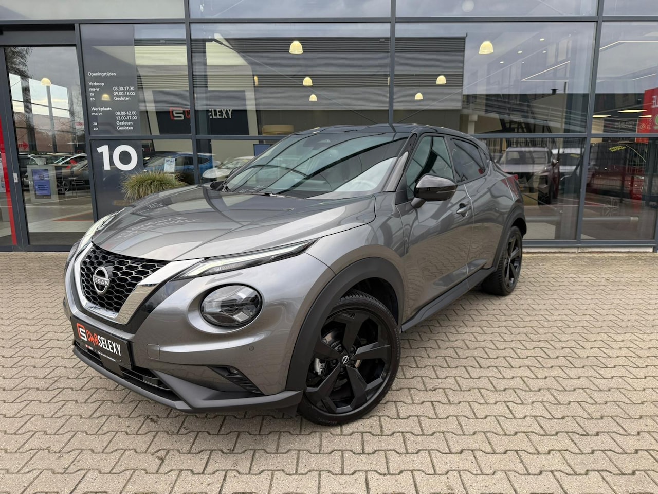 Nissan Juke - 1.0 DIG-T Tekna *ACC & Stoelverwarming* - AutoWereld.nl