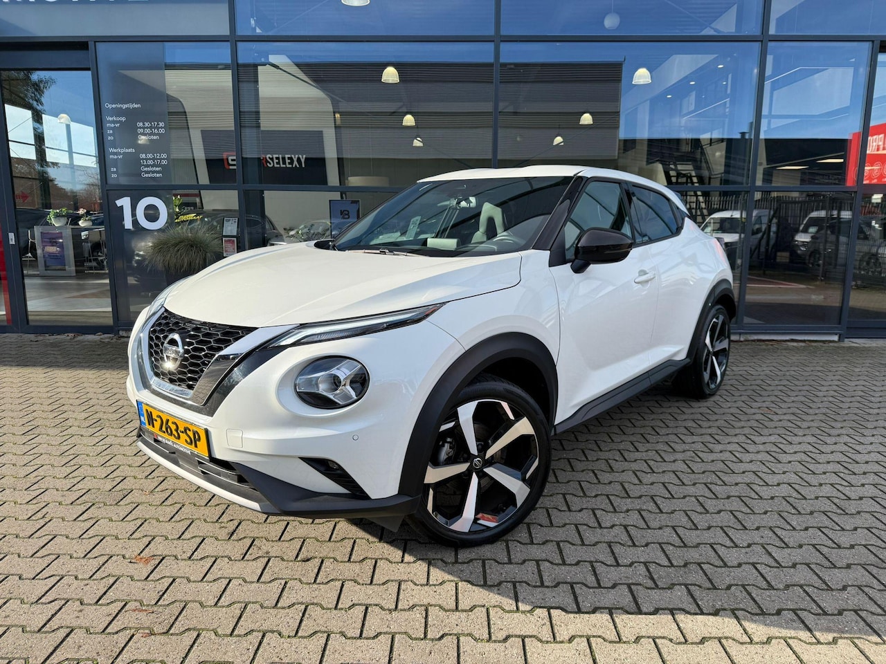 Nissan Juke - 1.0 DIG-T Tekna *Trekhaak & Adaptieve Cruise* - AutoWereld.nl