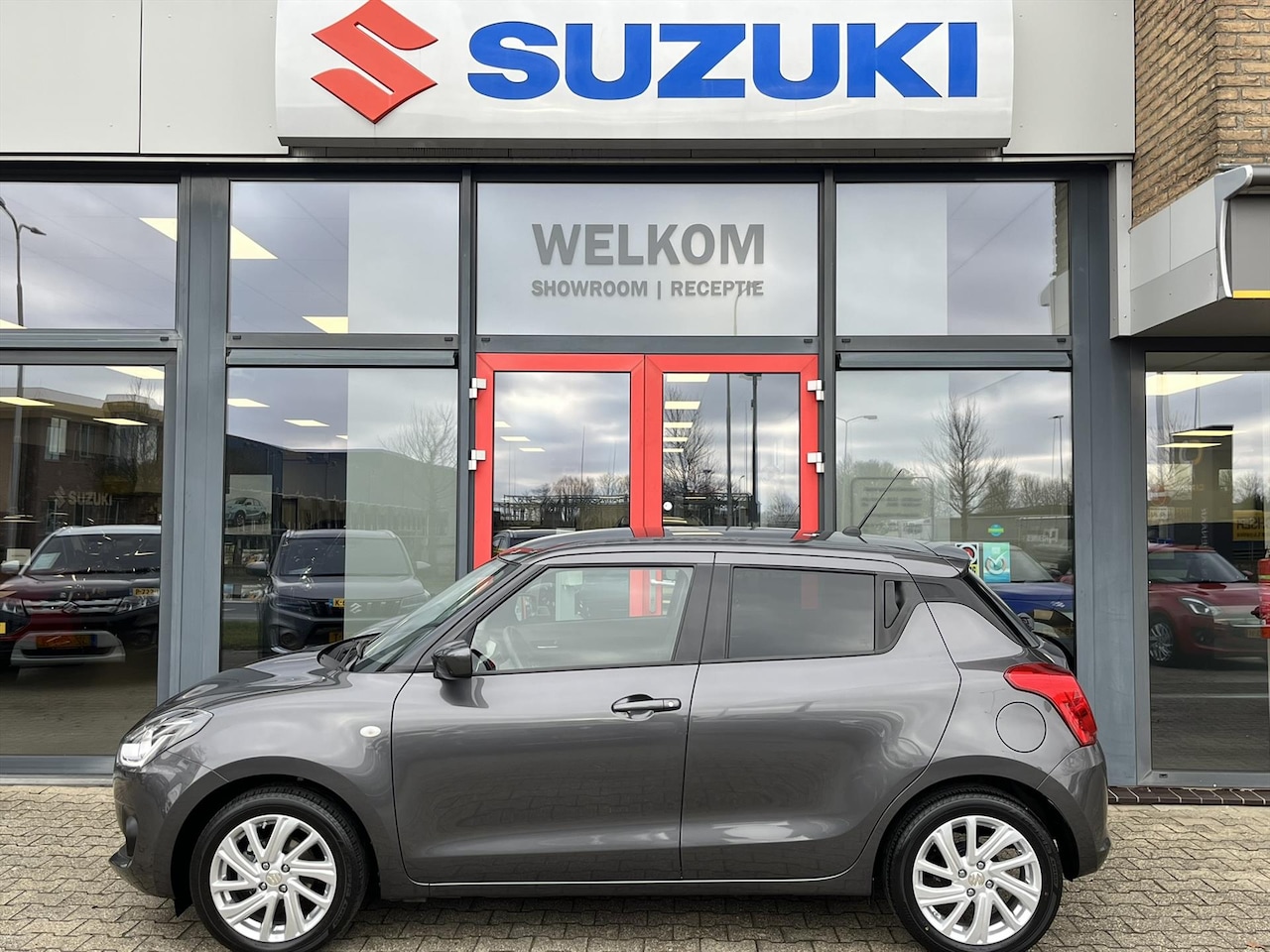 Suzuki Swift - 1.2 DualJet 83pk Smart Hybrid Select (RIJKLAARPRIJS) Tot 10 jaar Suzuki Garantie* - AutoWereld.nl