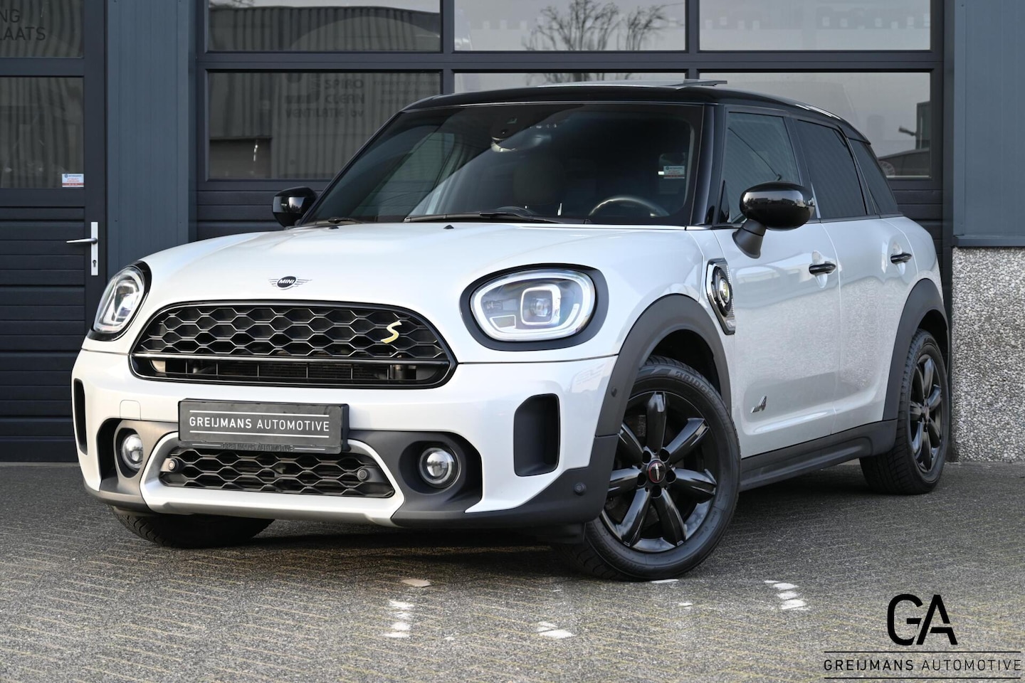 MINI Countryman - 1.5 Cooper S E ALL4 | Carplay|Panoramadak|Clima - AutoWereld.nl