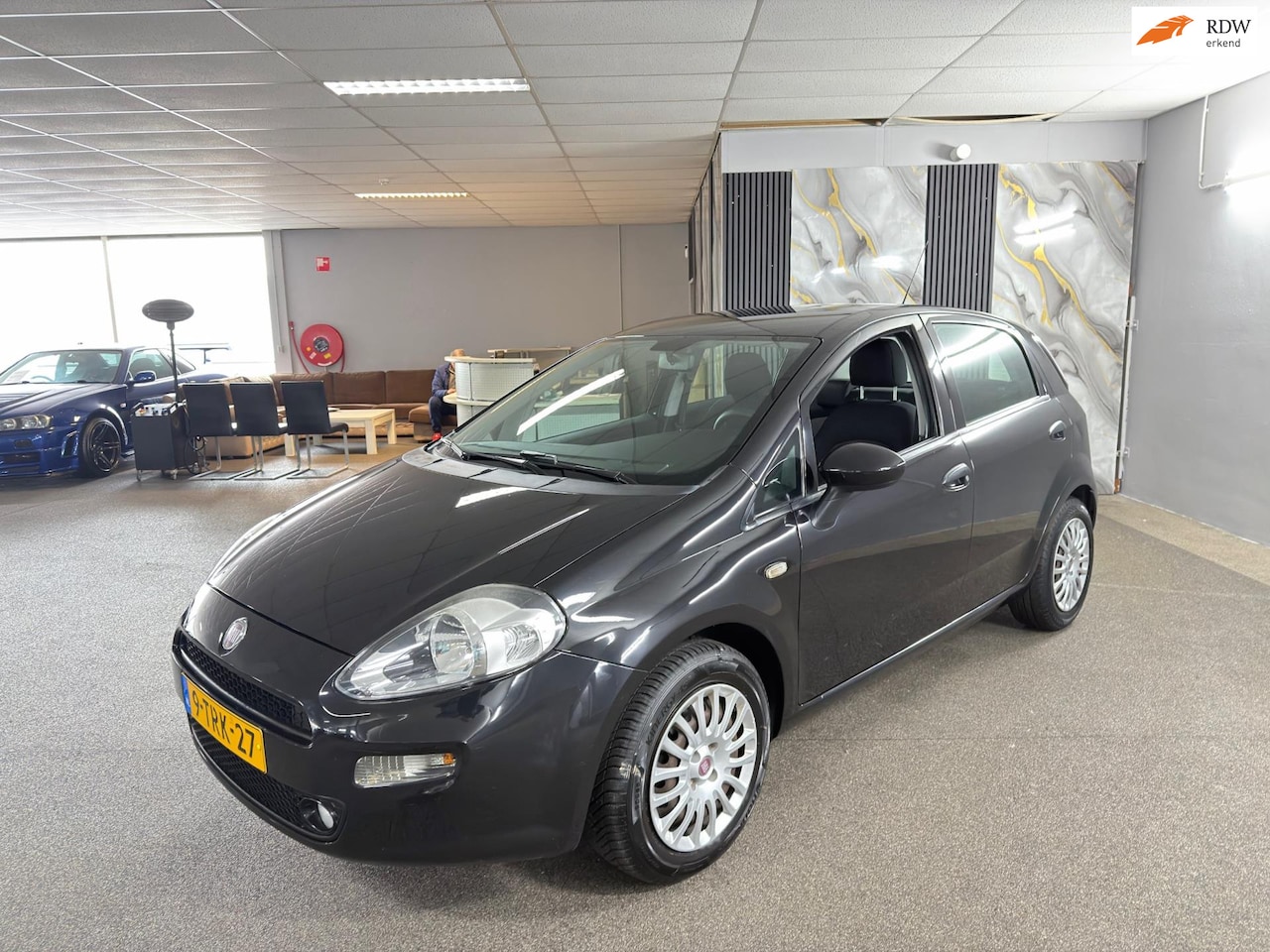 Fiat Punto Evo - 1.2 Pop Uitv. Airco,Electrische ramen,Start&Stop,N.A.P,Weinig kilometers,2 sleutels+Boekje - AutoWereld.nl