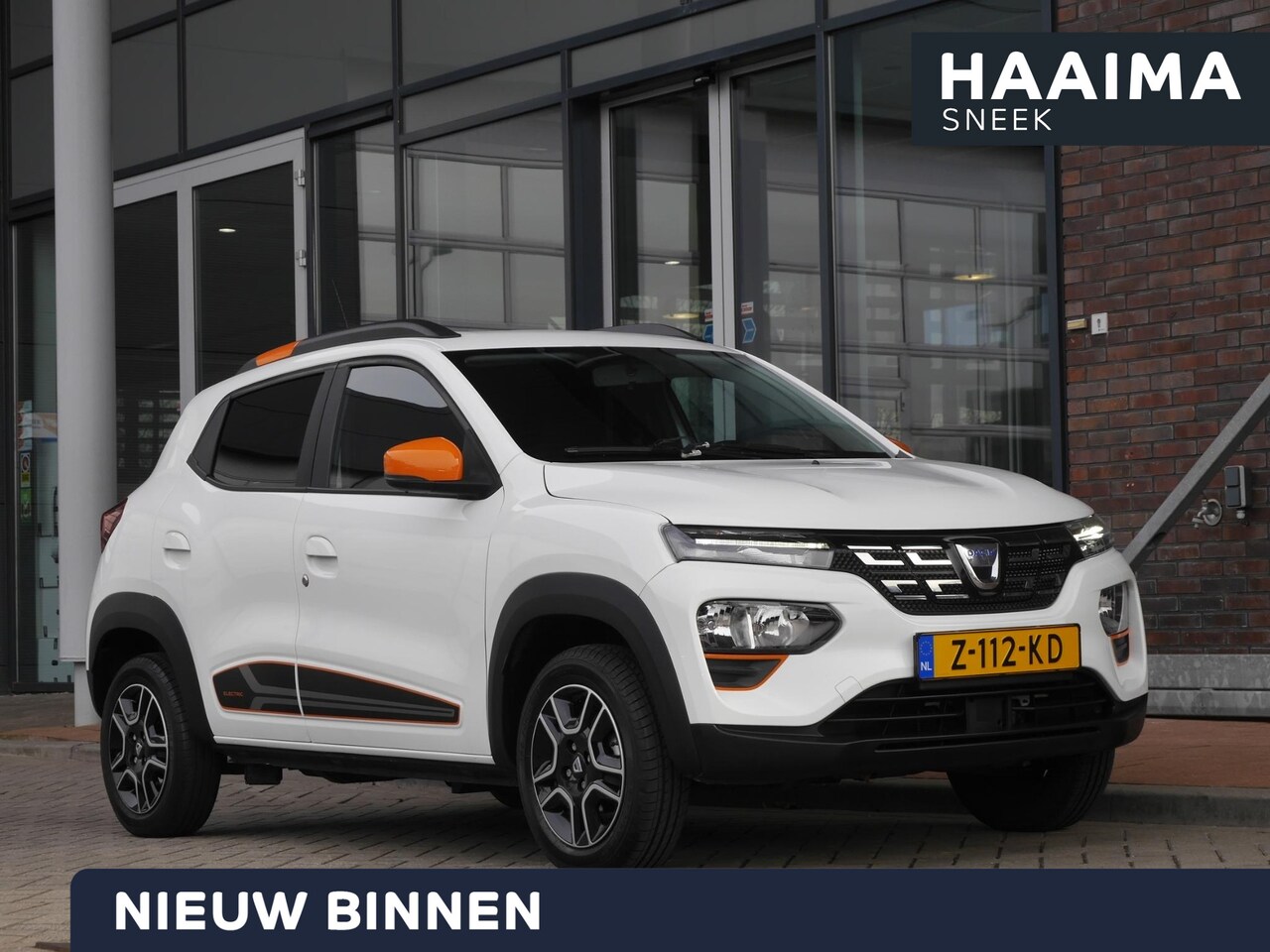 Dacia Spring - Expression 27 kWh | Achteruitrijcamera | Parkeersensoren achter | Lichtmetalen velgen | Ai - AutoWereld.nl