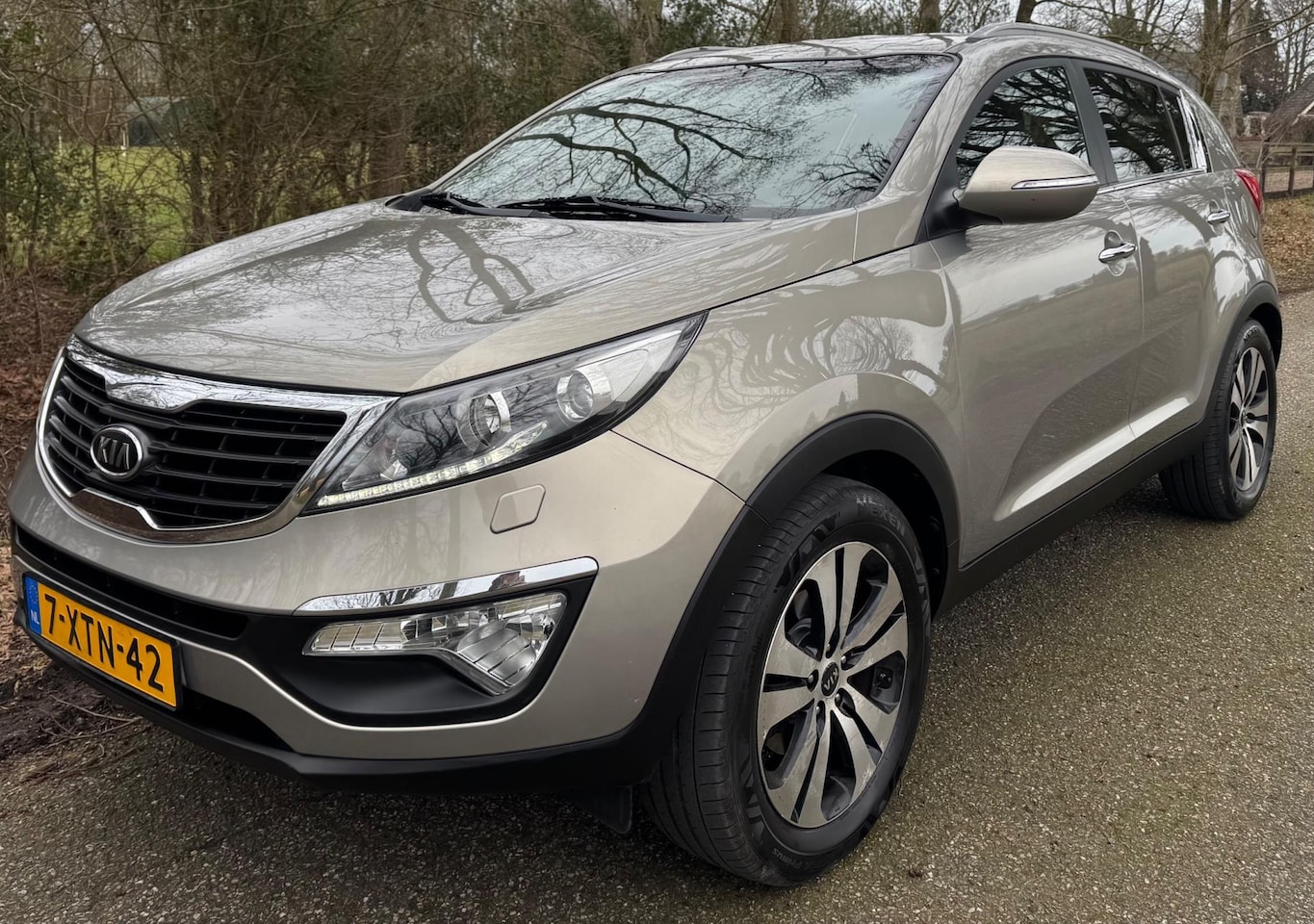 Kia Sportage - 2.0 X-clusive 2011 NAVI CLIMA CRUISE TREKHAAK - AutoWereld.nl