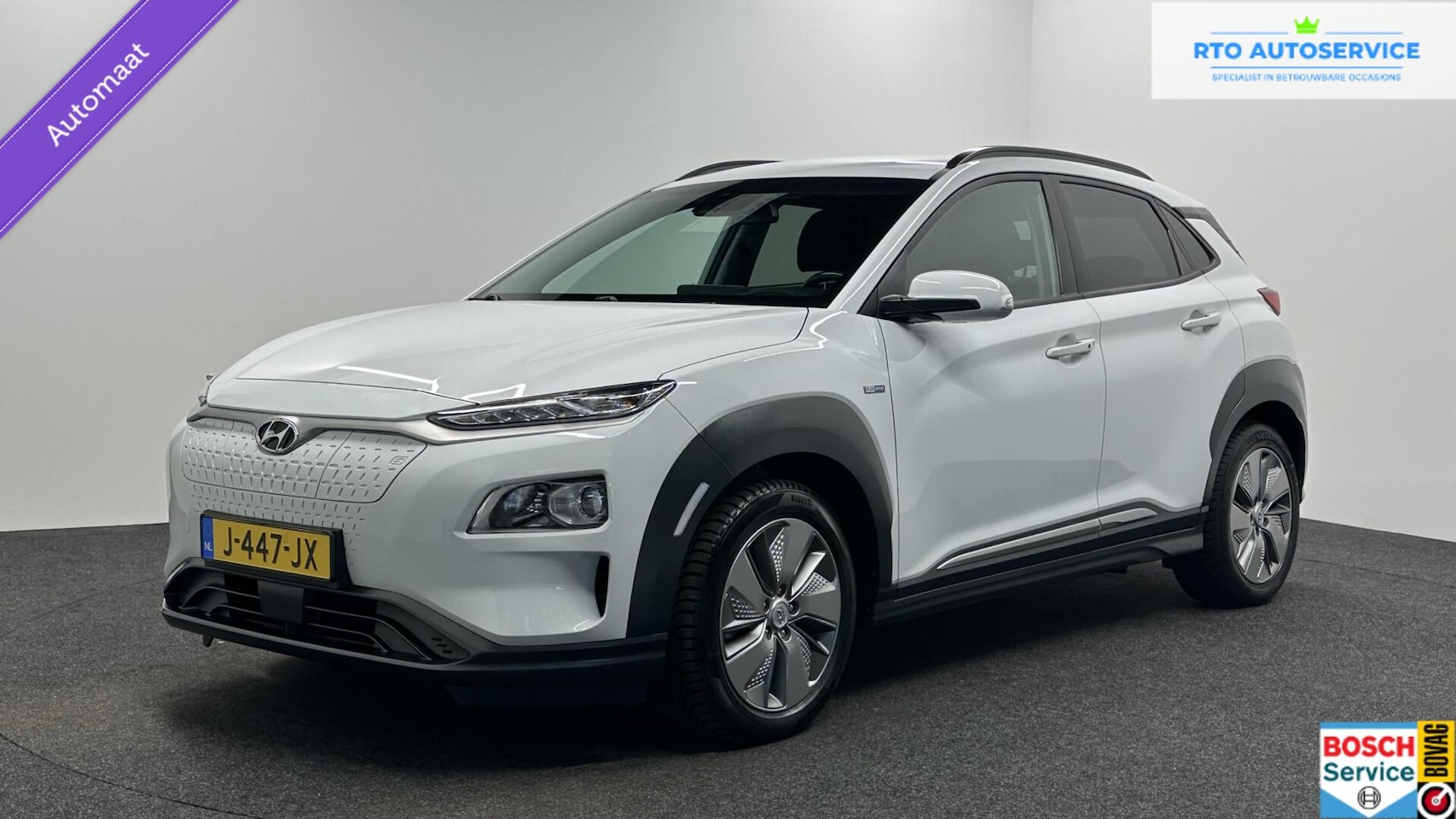 Hyundai Kona Electric - EV Comfort 64 kWh 3 Fase Warmtepomp 100 % SOH TREKHAAK CAMERA CARPLAY LM NAVI ECC. - AutoWereld.nl