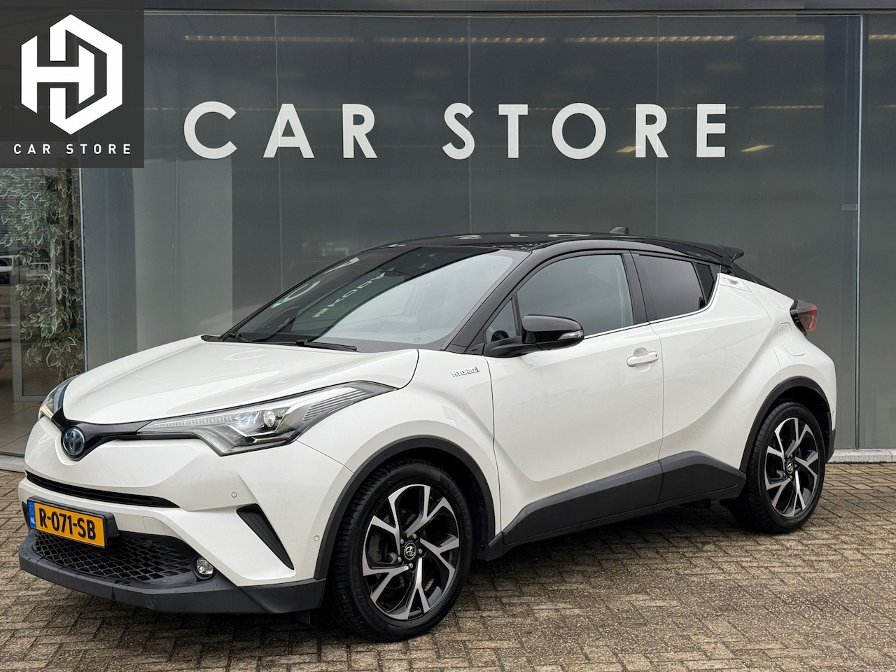 Toyota C-HR - 1.8 Hybrid Adventure Bi-Tone JBL|Dealer Onderhouden - AutoWereld.nl