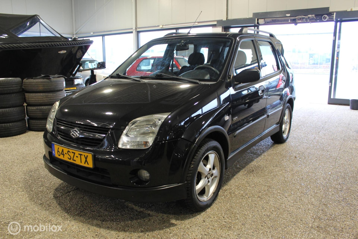 Suzuki Ignis - 1.3-16V FreeStyle airco. - AutoWereld.nl
