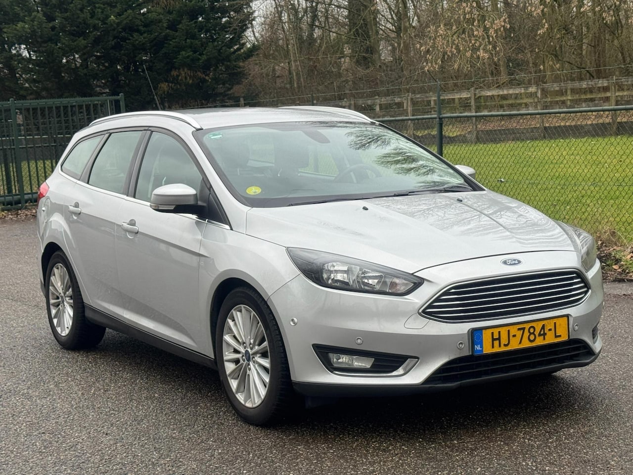 Ford Focus Wagon - 1.5 TDCI Titanium Edition /Navi/Trekhaak/Cruise/Airco/ - AutoWereld.nl