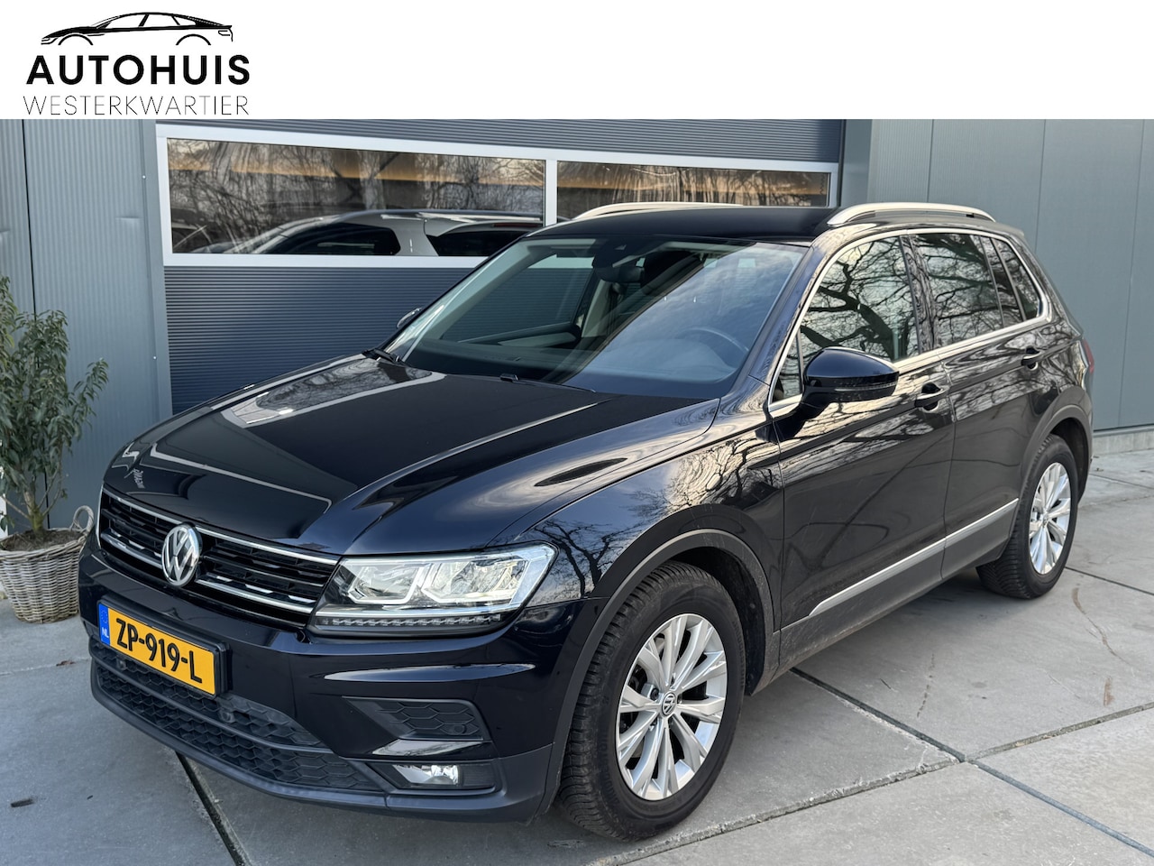 Volkswagen Tiguan - 1.5 TSI 150pk DSG ACT Comfortline Business Navigatie Keyless Trekhaak Stoelverwarming - AutoWereld.nl