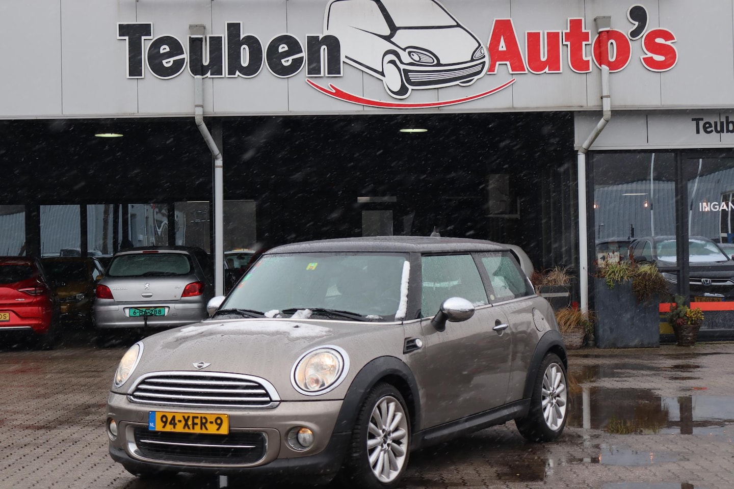 MINI Cooper - Mini 1.6 10 Years II Navigatie, Schuif- kanteldak, Lederen interieur, Stoelverwarming - AutoWereld.nl