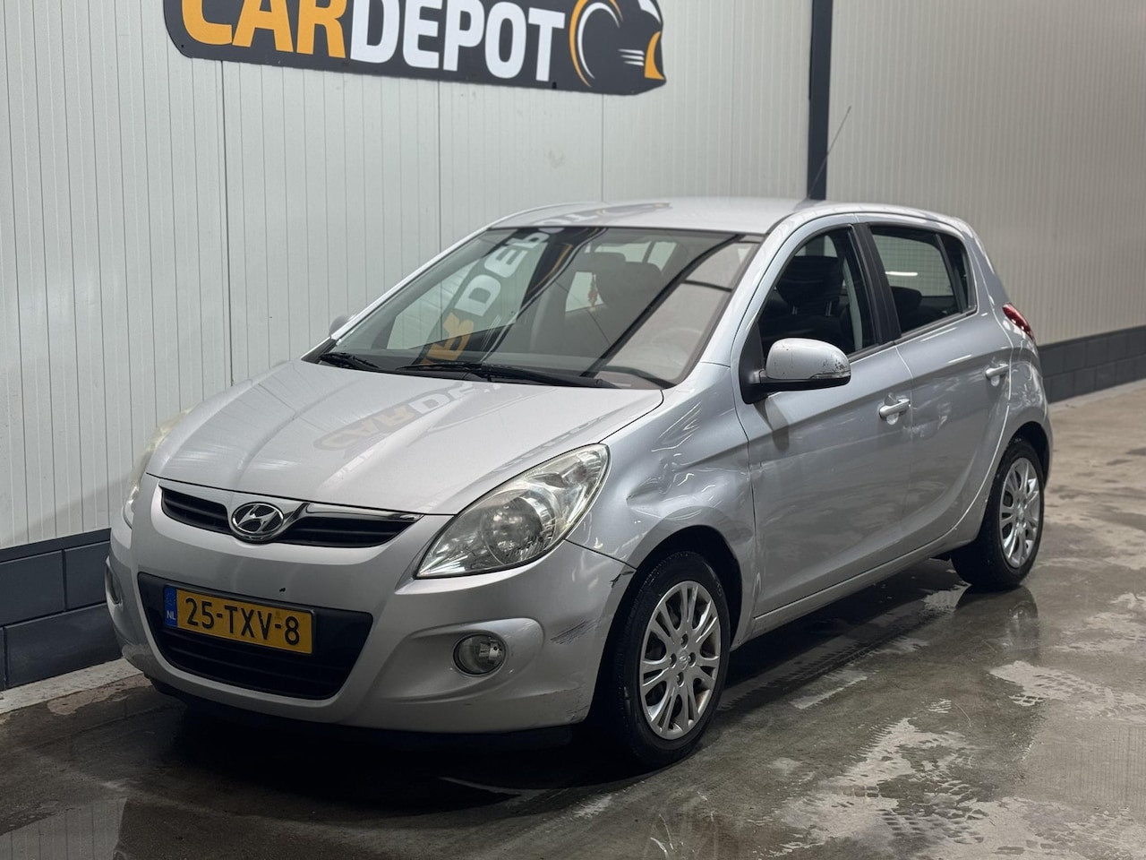 Hyundai i20 - 1.2i Plus 1.2i Plus - AutoWereld.nl