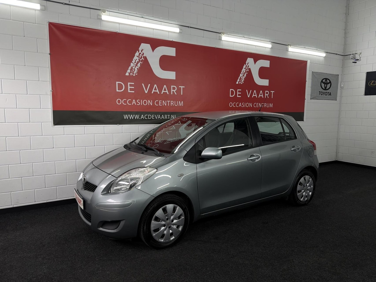 Toyota Yaris - 1.3 VVTi Dynamic - 1EIGENAAR/6BAK/AIRCO/NAV/NAP - AutoWereld.nl