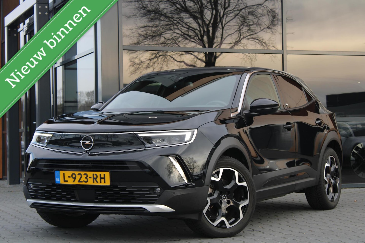 Opel Mokka-e - Elegance 50kWh 3-fase | Leer | Stoel/Stuurverwarming | Org. NL! - AutoWereld.nl