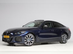 BMW i4 - M50 M-sport | schuifkanteldak | adap. cruise | head-up | 360 camera | harmankardon | elek.