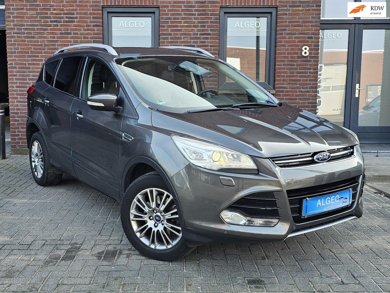 Ford Kuga - 1.6 Titanium 4WD / Automaat / Parkeerhulp / 2e eigenaar - AutoWereld.nl
