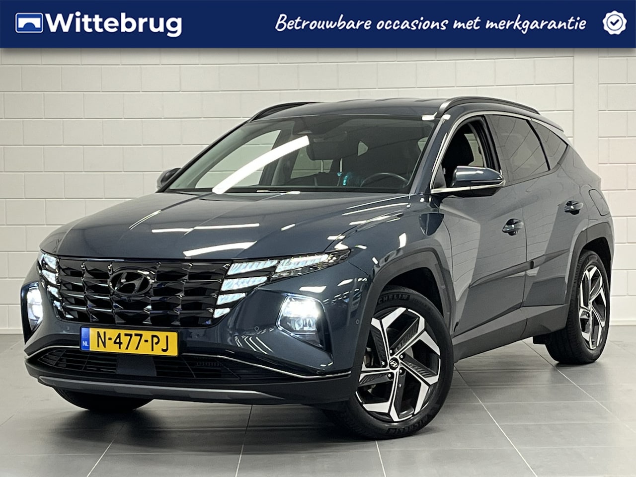 Hyundai Tucson - 1.6 T-GDI PHEV Premium 4WD TREKHAAK | LEDER | NAVIGATIE | DEALER ONDERHOUDEN! - AutoWereld.nl