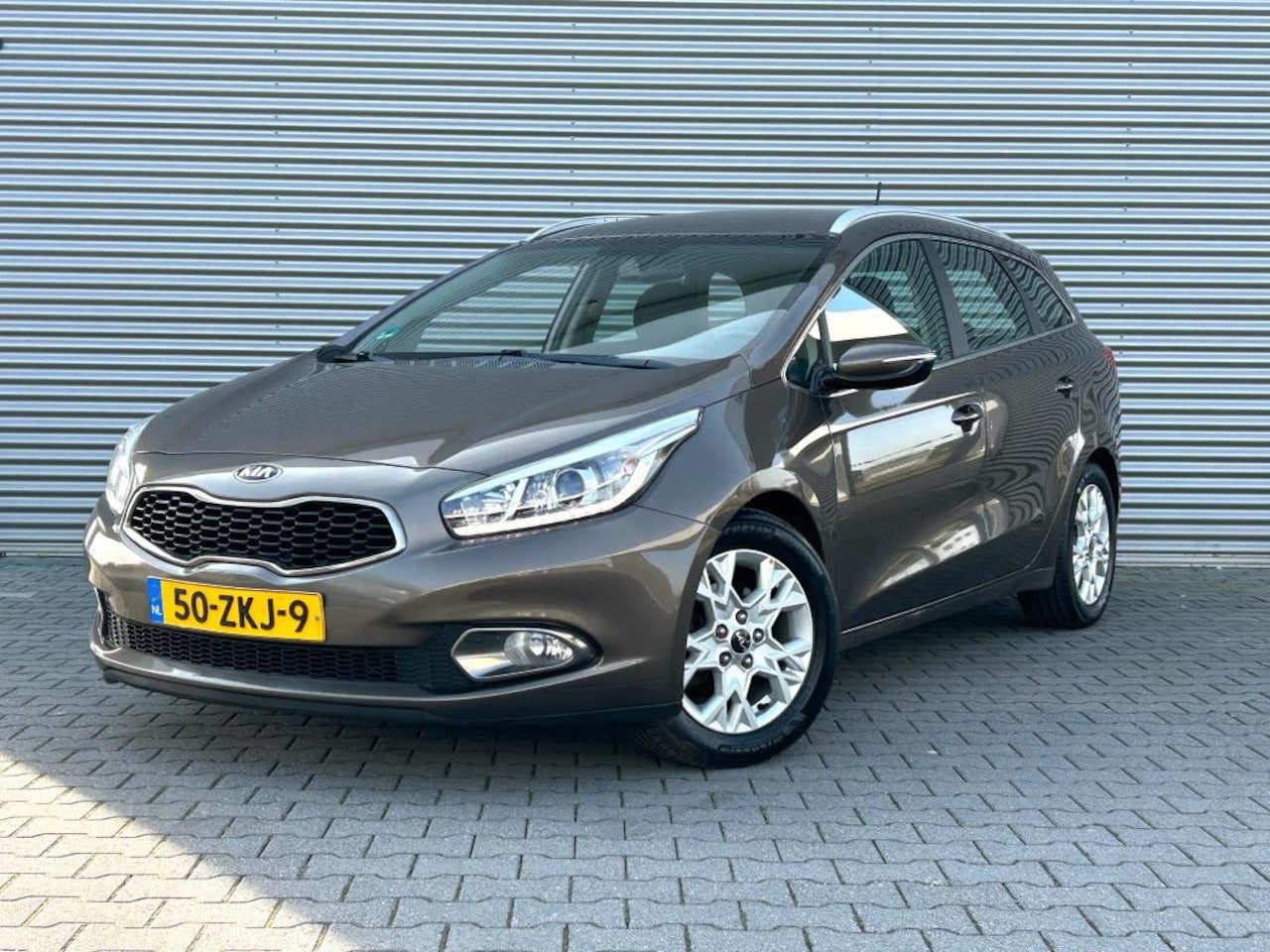 Kia Cee'd Sportswagon - 1.6 GDI Plus Pack | Airco | Cruise Control | Navi | Clima | - AutoWereld.nl