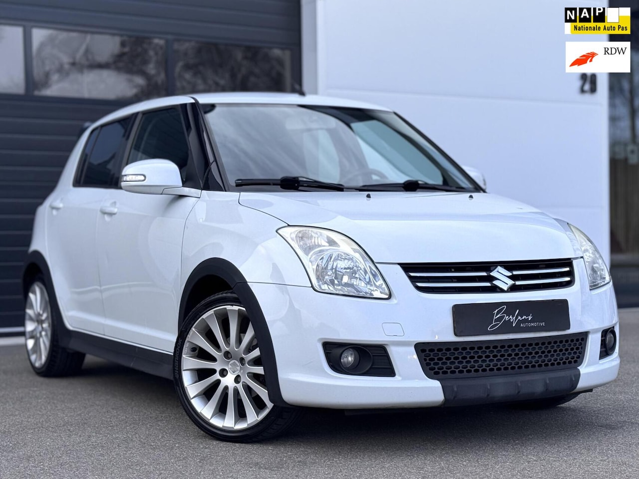 Suzuki Swift - 1.3 Bandit Org NL NAP | Airco | Stoelverw | LM - AutoWereld.nl