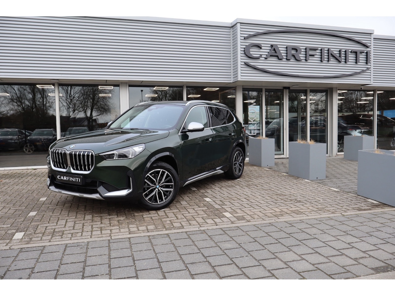 BMW X1 - SDrive18i / Navi / Widescreen / Cruise / Climate / Camera / Sfeerverlichting / Voll Leder - AutoWereld.nl