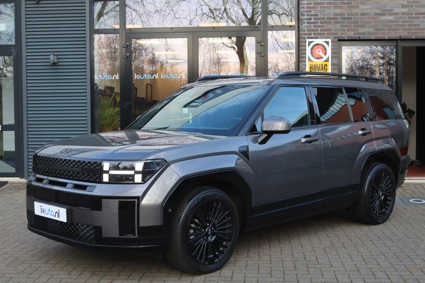 Hyundai Santa Fe - 1.6 T-GDI PHEV 252PK Black Line 4WD 7p. LED/Leder/360/Bose/Keyless/Head-up/Elek. stoelen+m - AutoWereld.nl