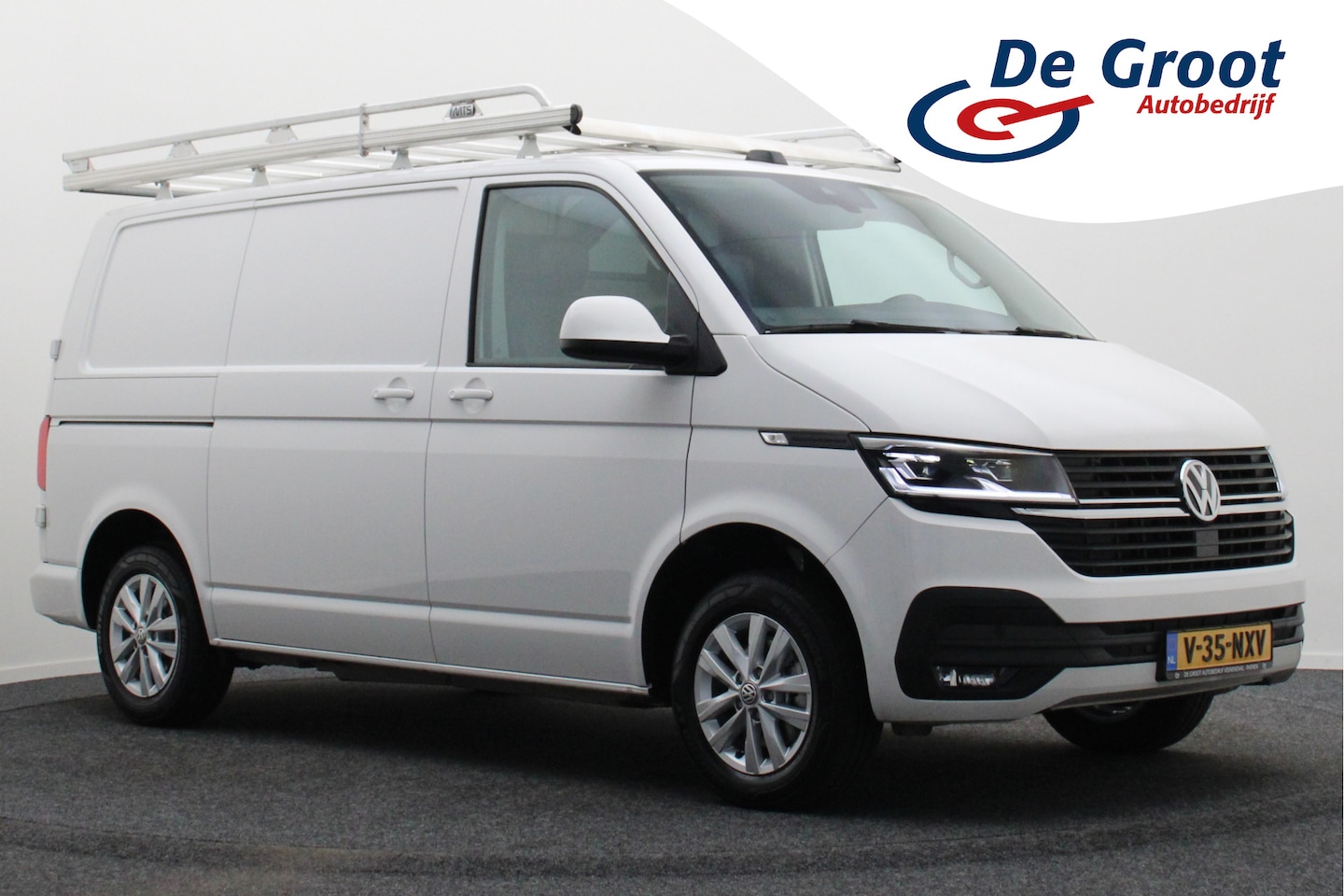 Volkswagen Transporter - 2.0 TDI DSG L1H1 Leer, Airco, Apple Carplay, Camera, Cruise, Imperiaal, PDC, Trekhaak, 16' - AutoWereld.nl
