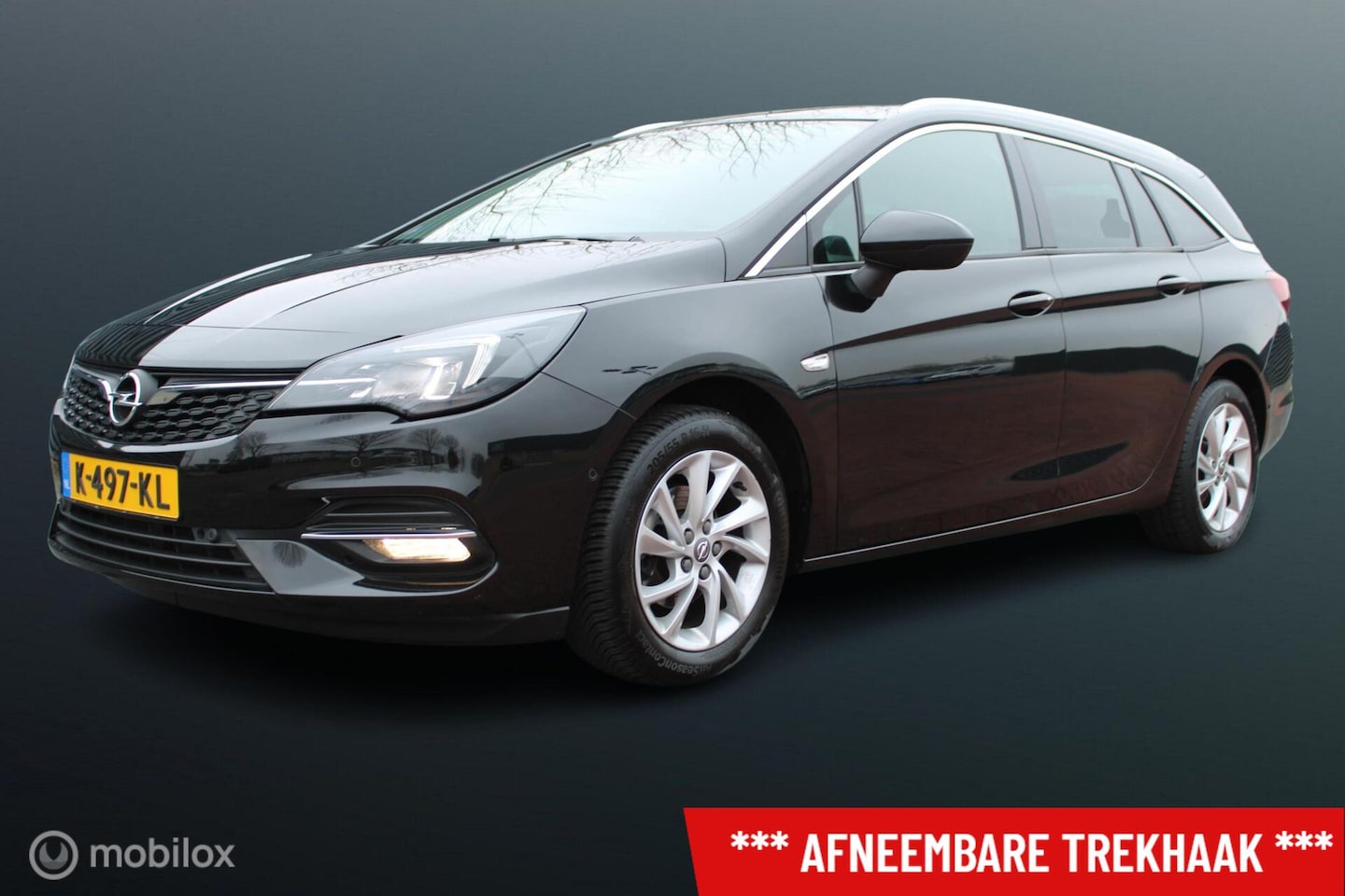 Opel Astra Sports Tourer - 1.2 Turbo 130 PK Business Elegance, Trekhaak, Navi, Pdc voor + achter + camera, Donker gla - AutoWereld.nl