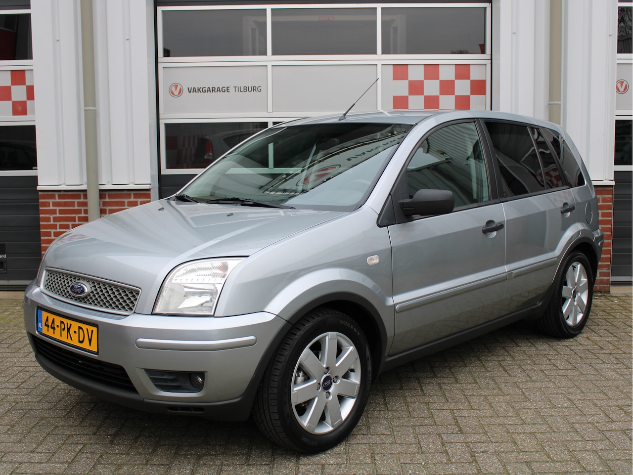 Ford Fusion - 1.4-16V Futura AIRCO/Trekhaak/16'LM/Donker glas/Elek. ramen/Stuurbekrachtiging/D-riem rece - AutoWereld.nl