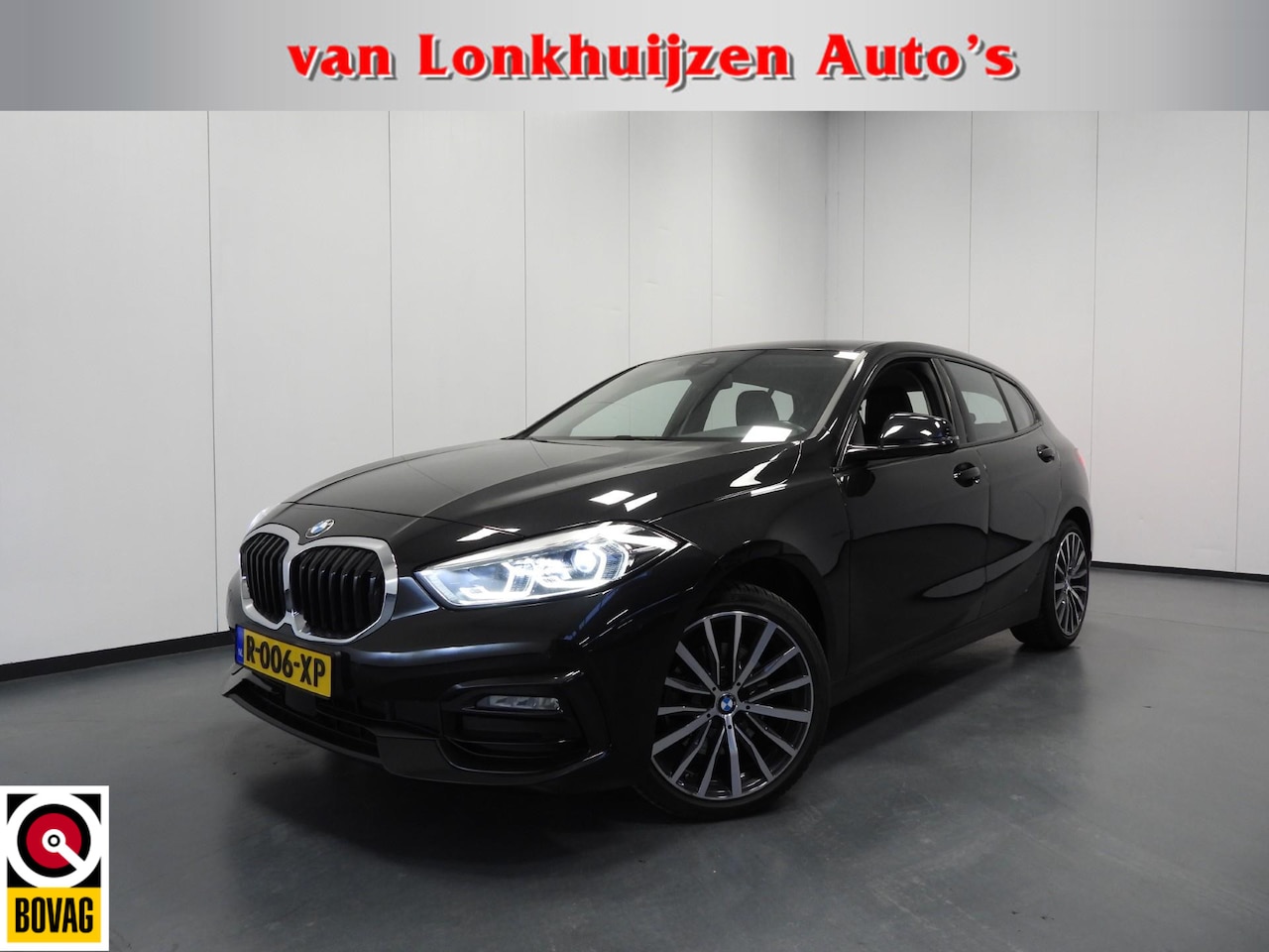 BMW 1-serie - 118i Aut. Intro Sport Line VOL LEER/NAVI/CAMERA/LED/18"LMV! - AutoWereld.nl