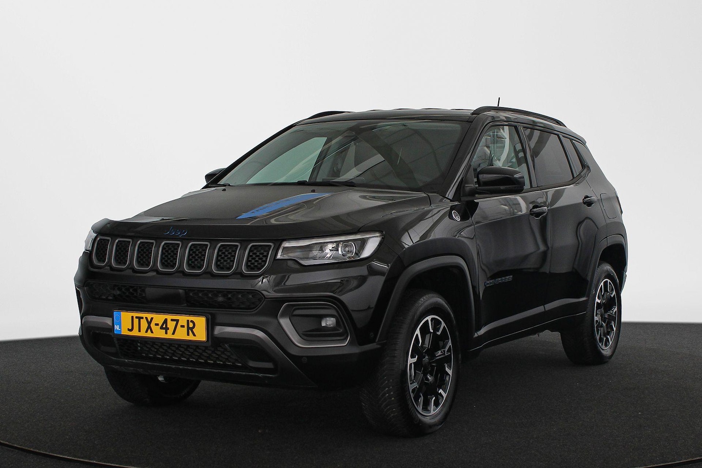 Jeep Compass - 4xe 240 Plug-in Hybrid Electric Trailhawk SOH 98% Memory Stoelventilatie Leder - AutoWereld.nl