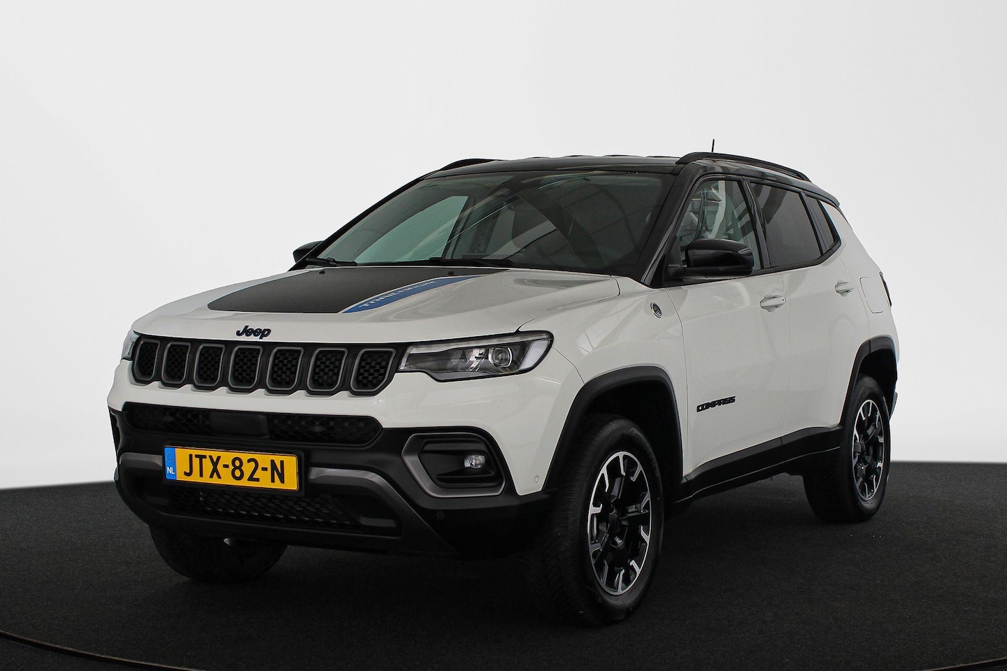 Jeep Compass - 4xe 240 Plug-in Hybrid Electric Trailhawk SOH 98% Memory Stoelventilatie Leder - AutoWereld.nl